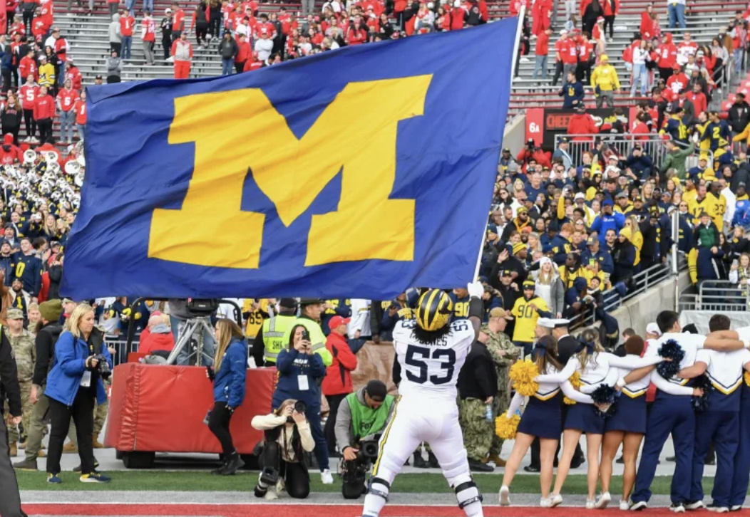 WATCH: Eddie George pays off Michigan vs Ohio State bet with Taylor Lewan -  On3