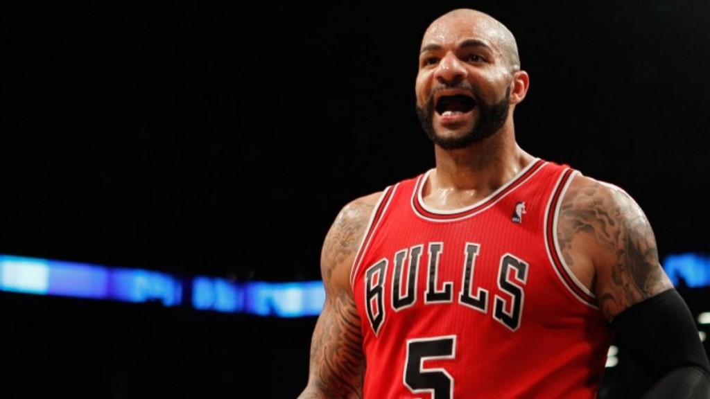 Carlos Boozer Left Benny The Bull Hanging On High Five During Christmas